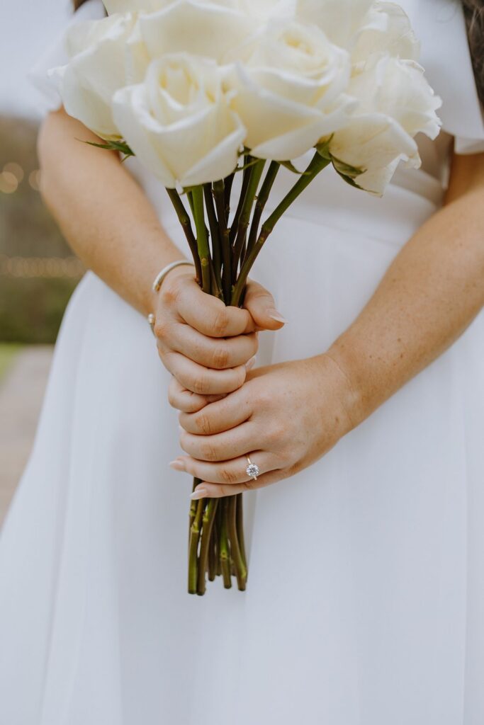 Bride holding flower bouquet