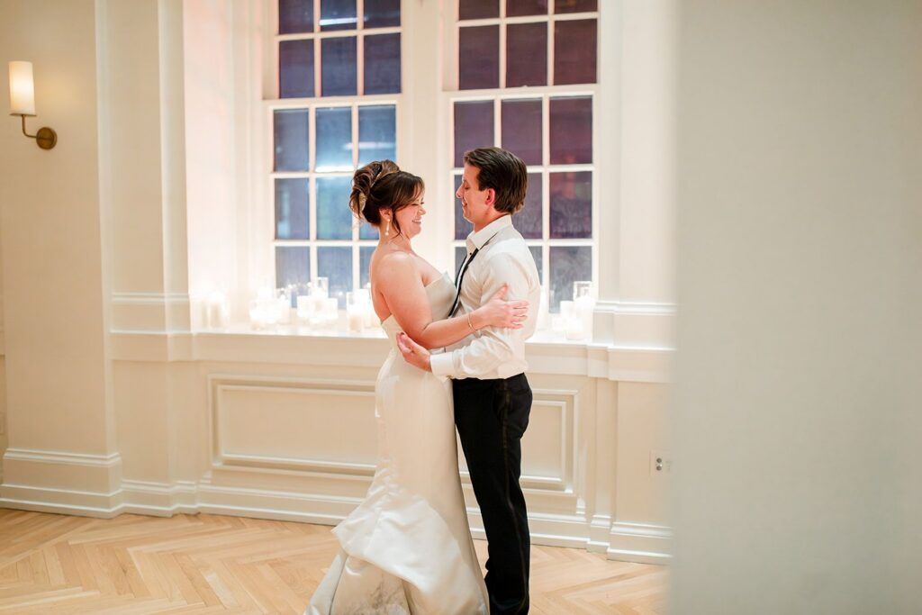 Bride and groom hugging moment