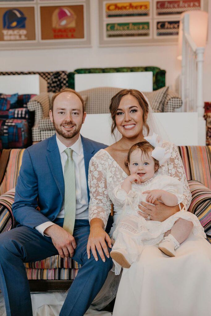 Bride and groom with baby invited to wedding
