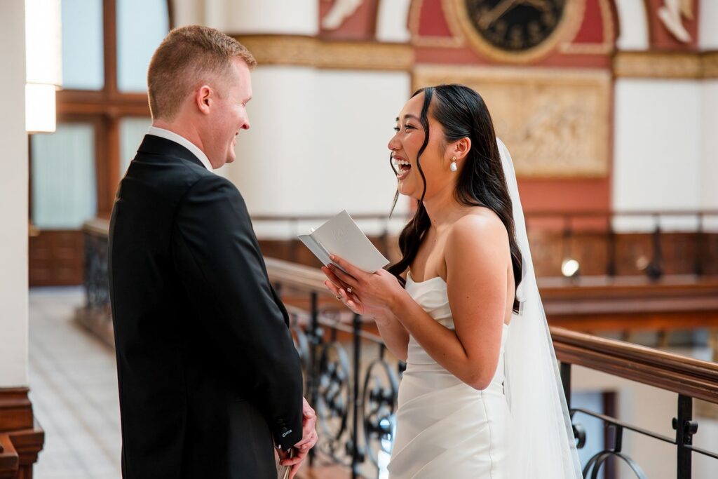 Bride and groom exchange personalized wedding vows