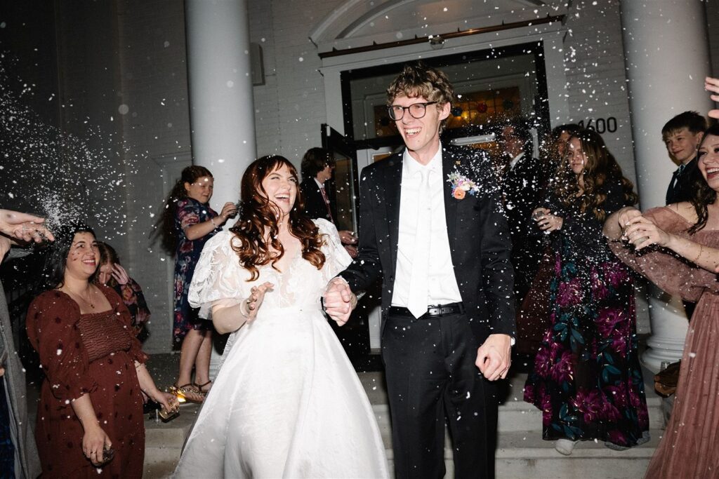 Bride and groom grand exit at wedding