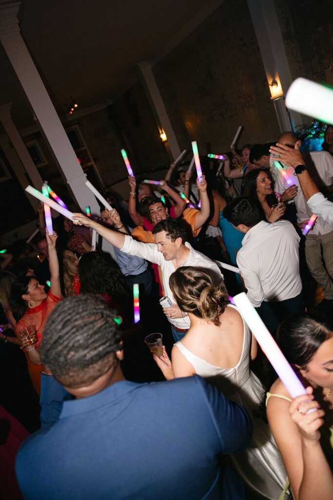Wedding guests dancing at reception