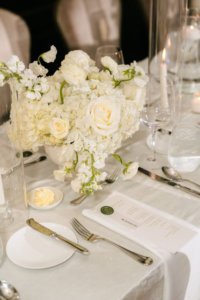 Wedding design table setting white floral centerpiece