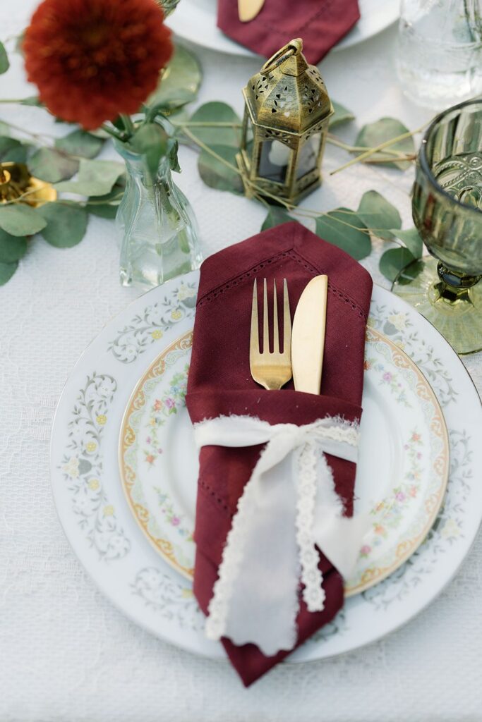 Wedding design table setting with silverware and china