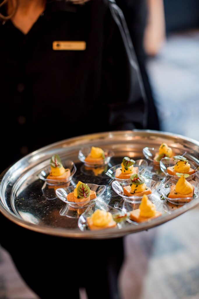 Caterer with serving tray