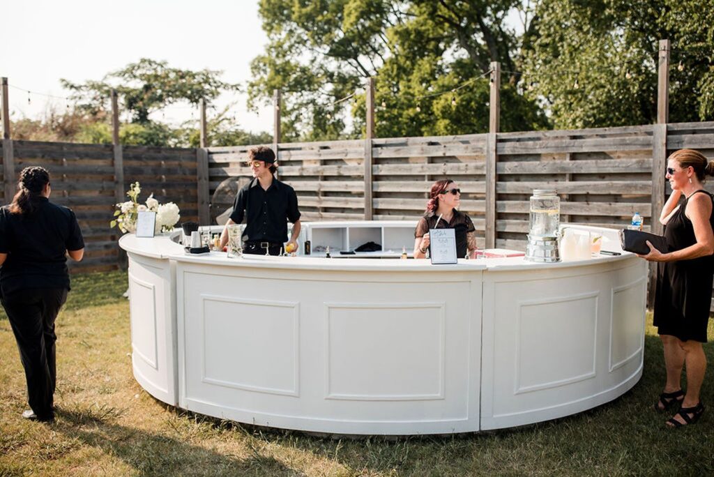 a semi-circle bar at a wedding reception