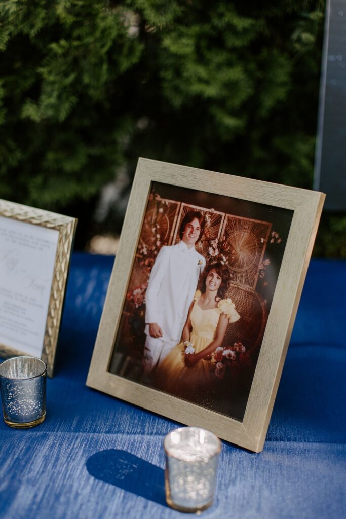 prom photos showcased at a wedding