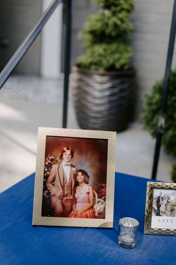 prom photos showcased at a wedding